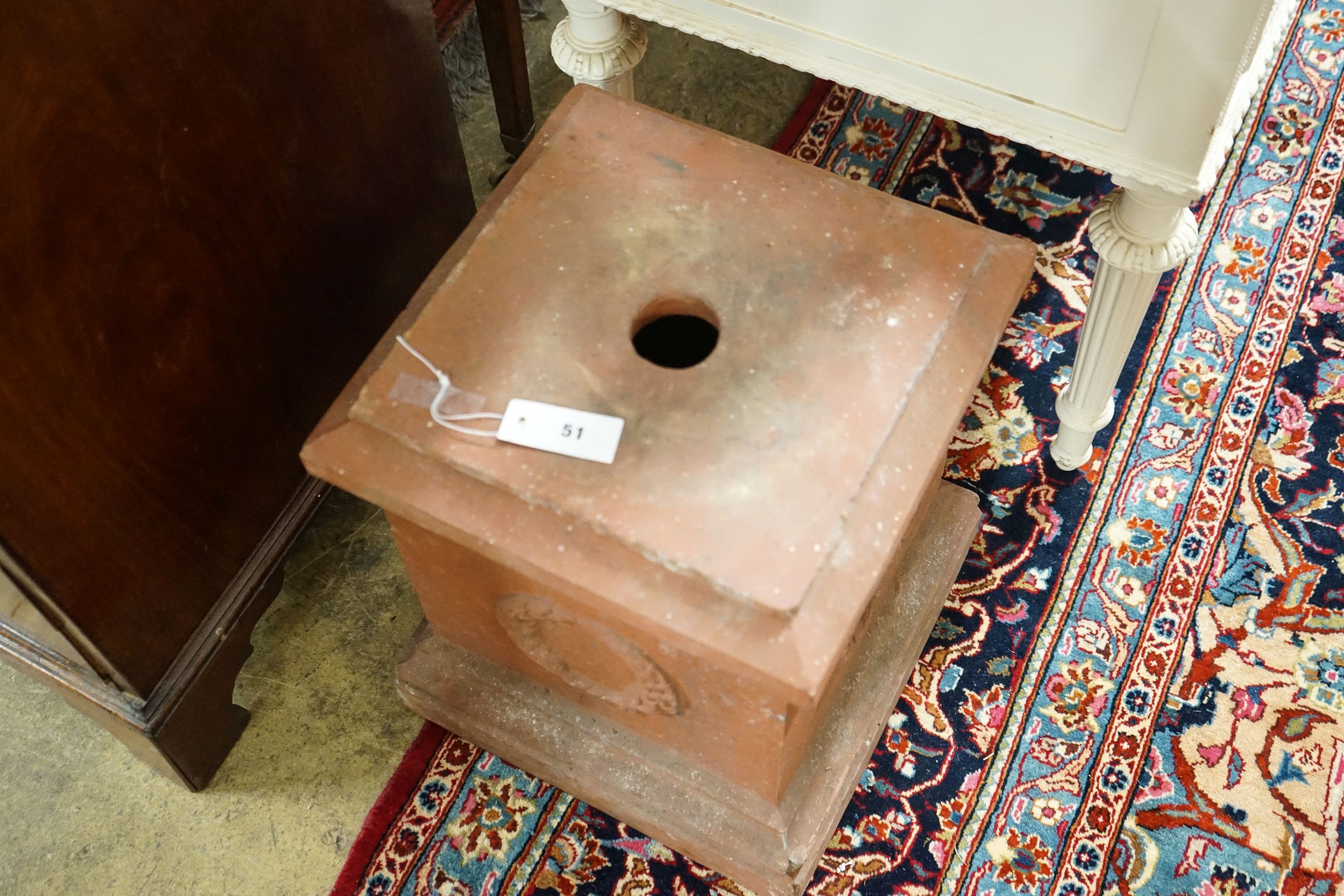 A square terracotta garden plinth, width 35cm, height 46cm